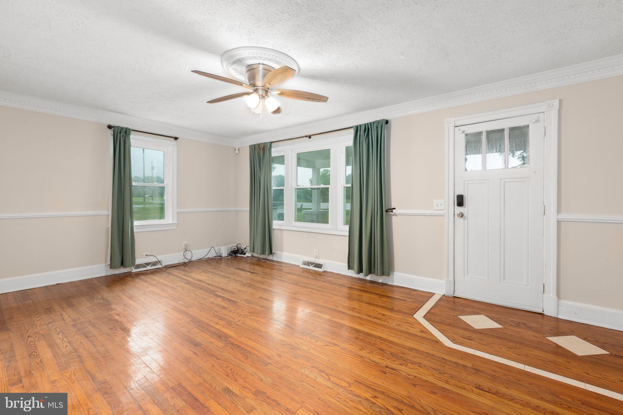 10669 Post Oak Road Spotsylvania, VA 22551 - Photo 8 of 27 Family room with hardwood floors