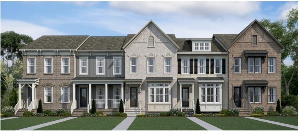 3245 Herald Drive Scottdale, GA 30079 - Photo 1 of 1 a front view of a residential apartment building with a yard