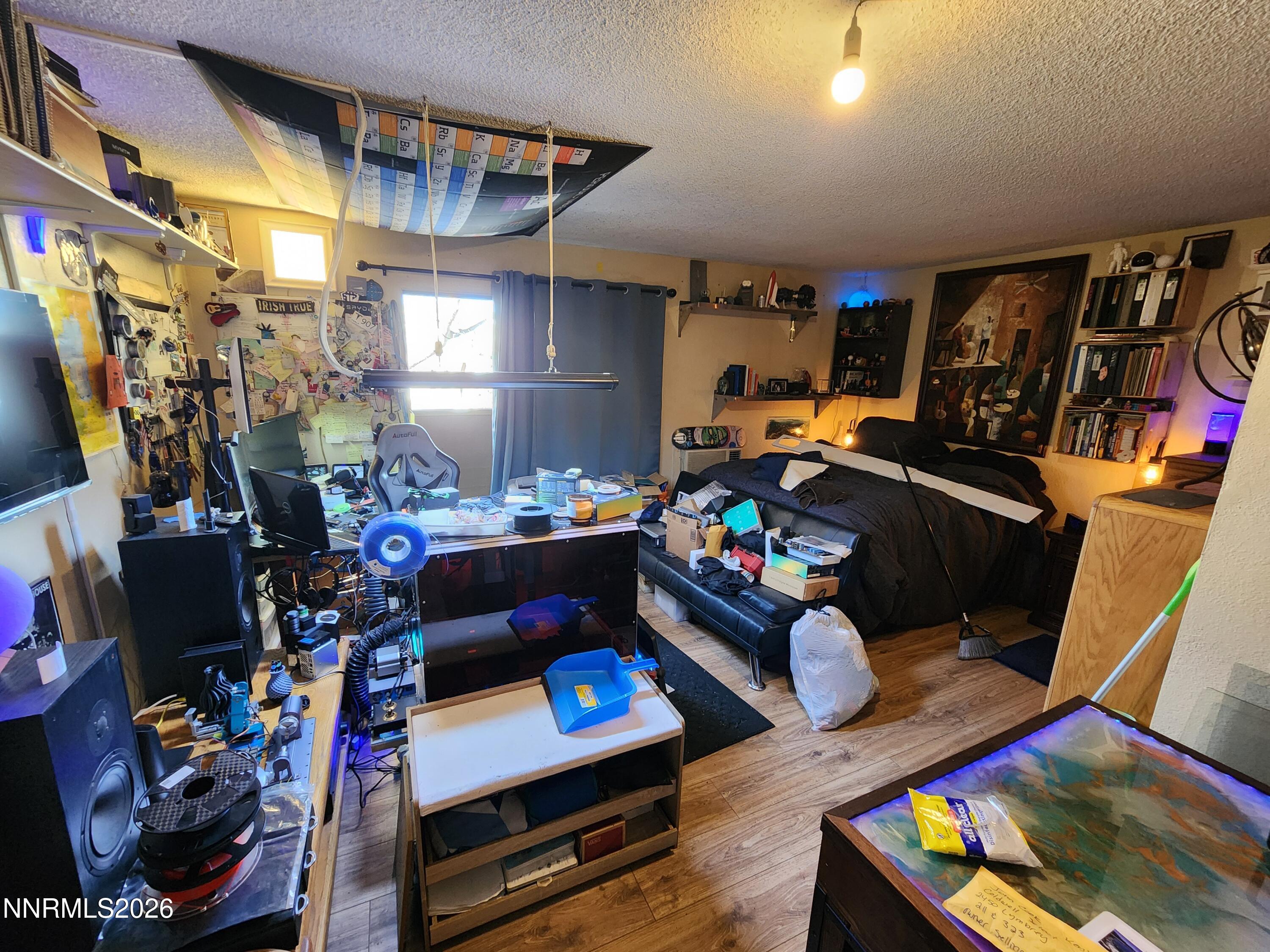 2450 Lymbery Street, Unit 211 Reno, NV 89509 - Photo 11 of 14 a room with furniture and a gym equipment