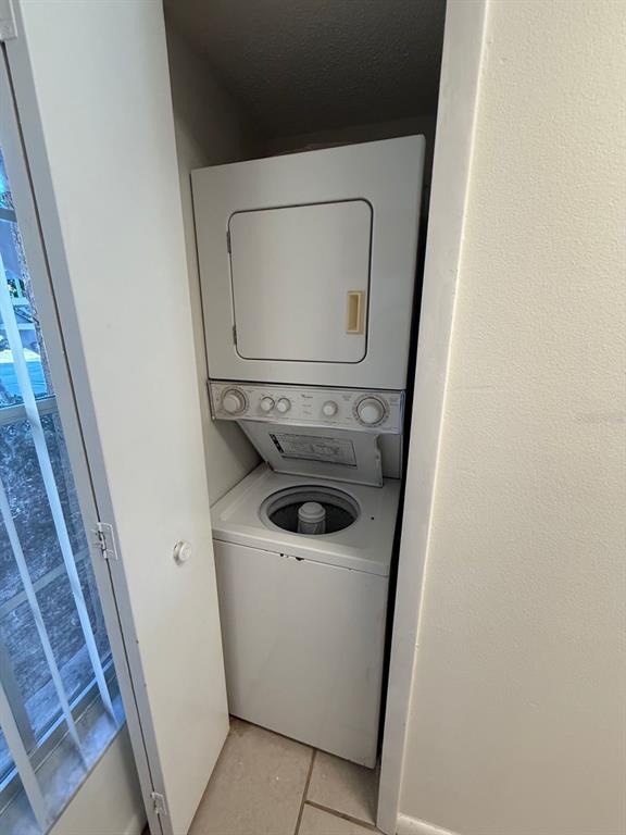 6334 Spring Flower Drive, Unit 14 New Port Richey, FL 34653 - Photo 17 of 25 a utility room with dryer and washer