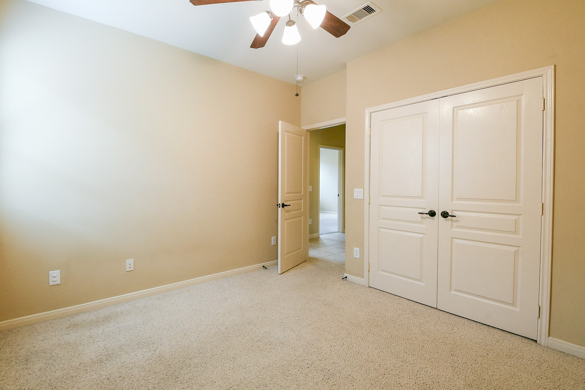 1619 Ralston Branch Way Sugar Land, TX 77479 - Photo 15 of 20 an empty room with a ceiling fan and a window