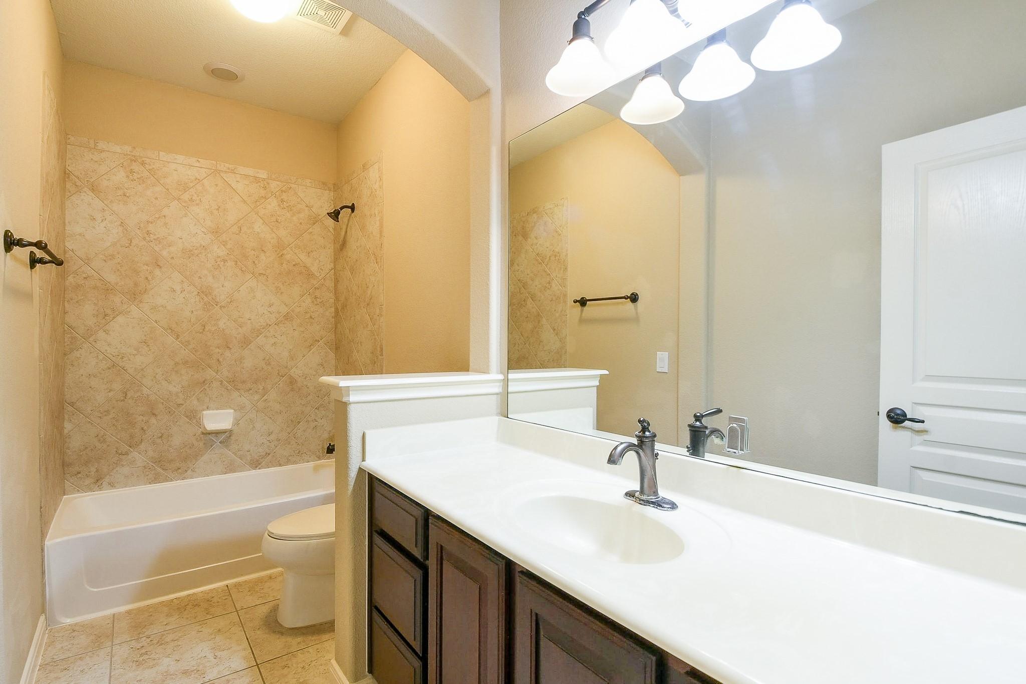 1619 Ralston Branch Way Sugar Land, TX 77479 - Photo 16 of 20 a bathroom with a bathtub a sink and a mirror
