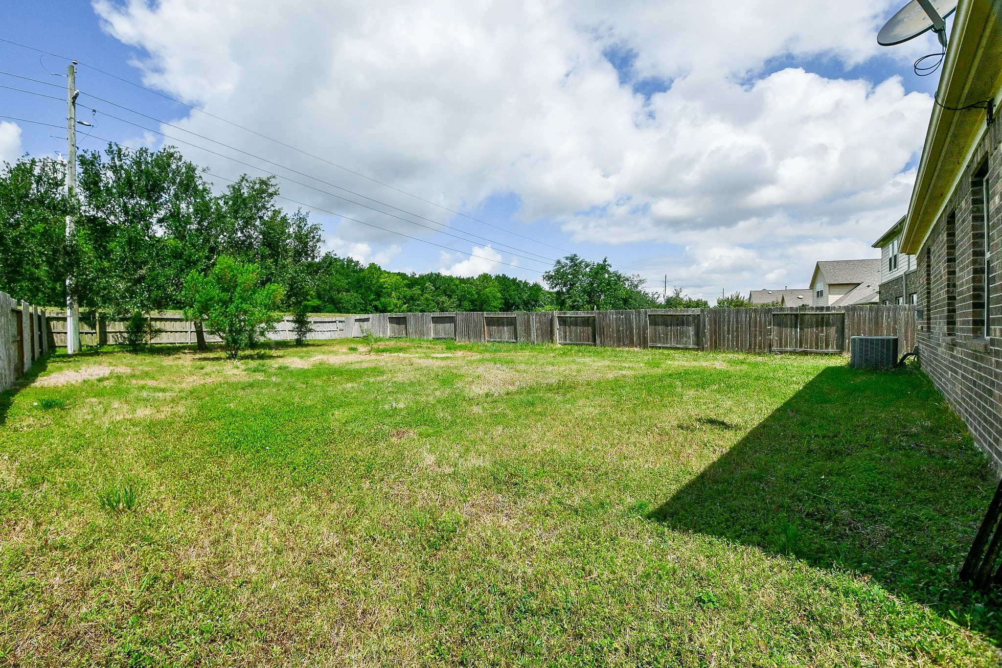 1619 Ralston Branch Way Sugar Land, TX 77479 - Photo 19 of 20 a view of a park with large trees