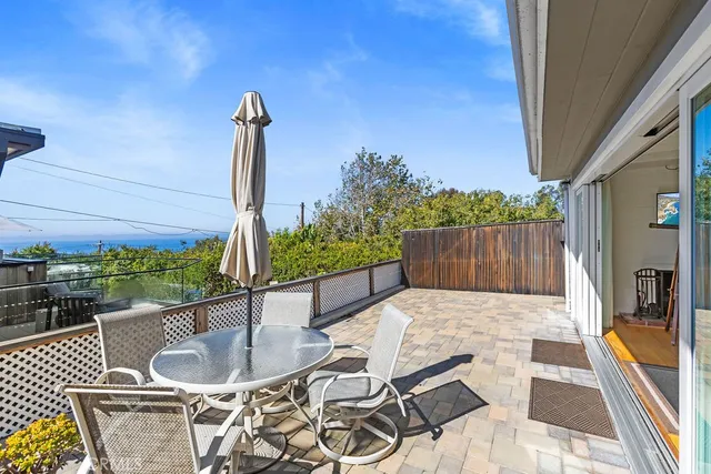 a view of balcony with furniture and outdoor space