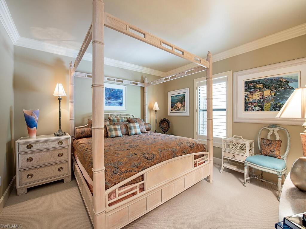 3133 Rum Row Naples, FL 34102 - Photo 27 of 35 a bed room with a bed and a window