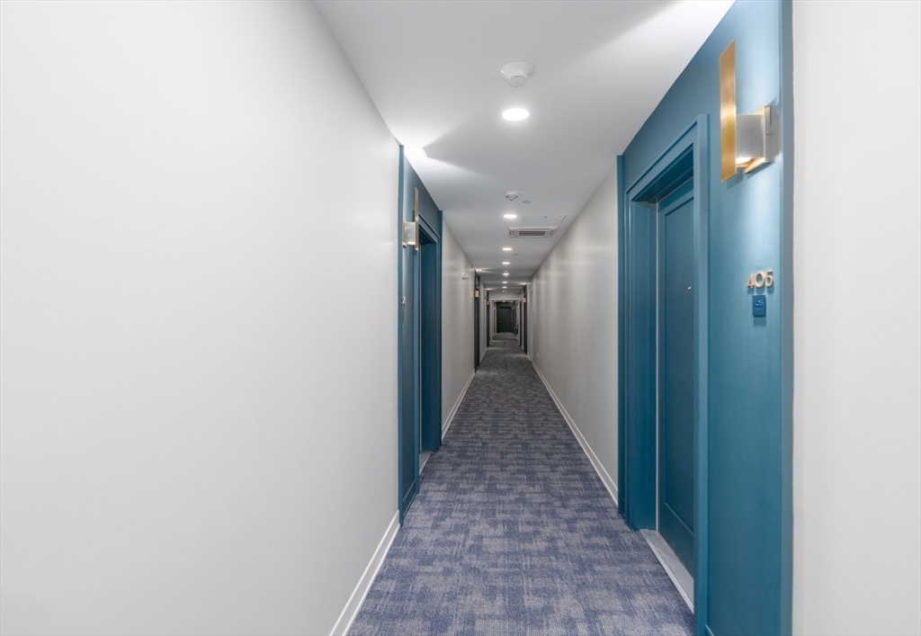 500 Talbot Avenue, Unit 403 Boston, MA 02124 - Photo 25 of 25 a view of a hallway with the glass door