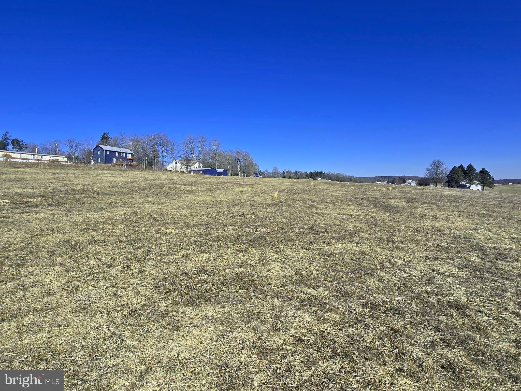 391 Springs Road Grantsville, MD 21536 - Photo 8 of 19 a view of lake and sunset