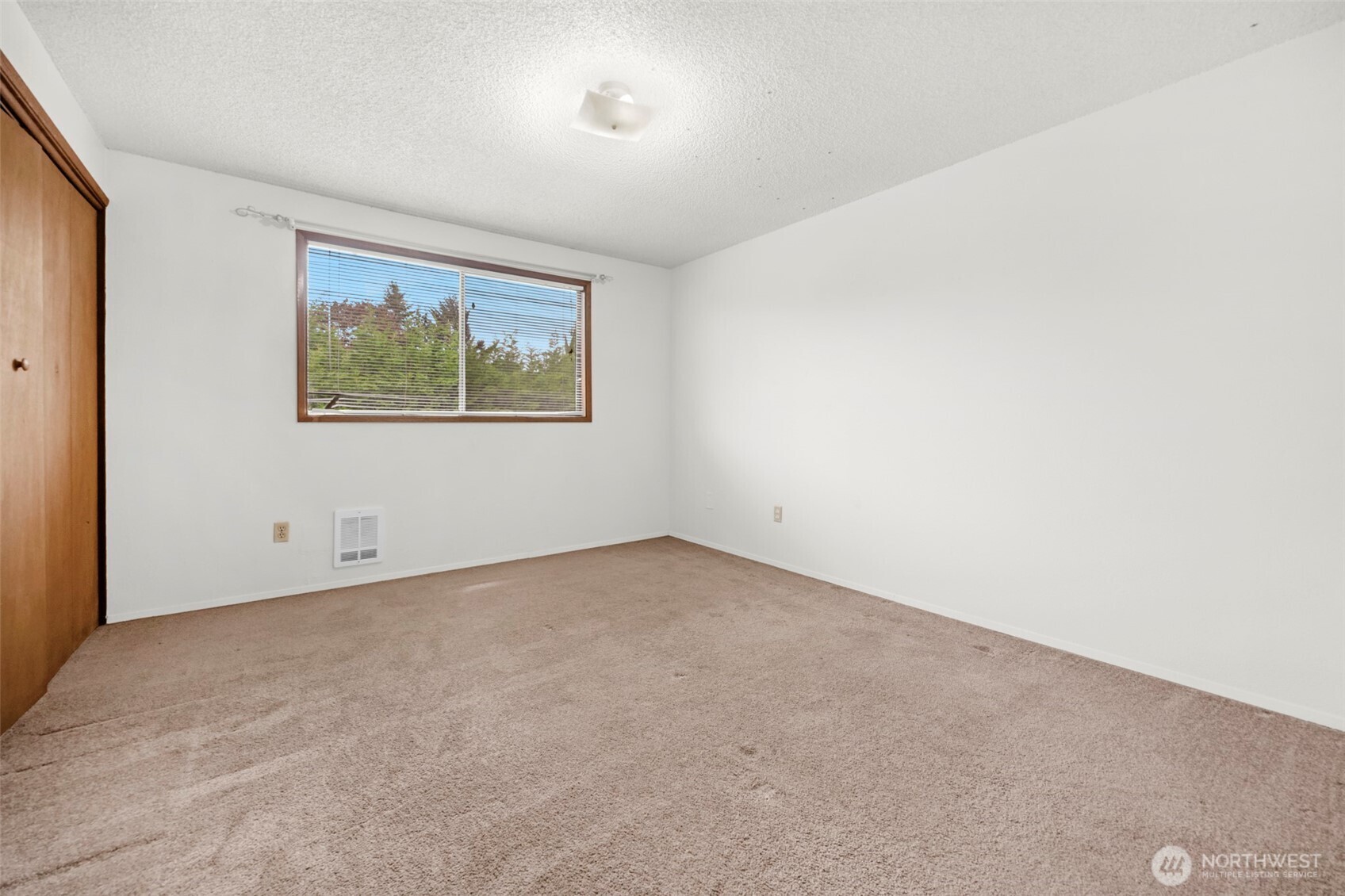 6920 Armar Road Marysville, WA 98270 - Photo 19 of 24 an empty room with a window