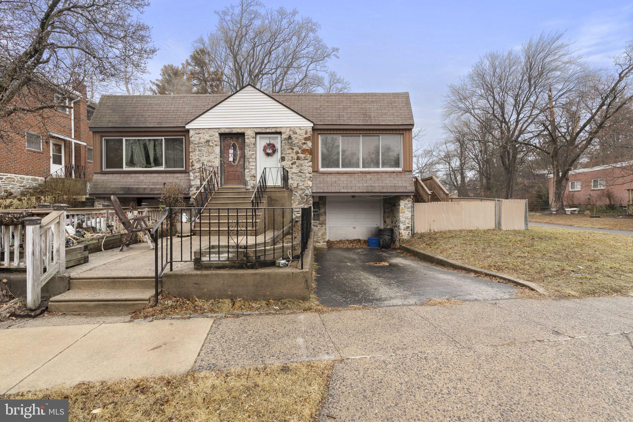 201 Juniper Road Havertown, PA 19083 - Photo 1 of 30 a front view of a house with garage