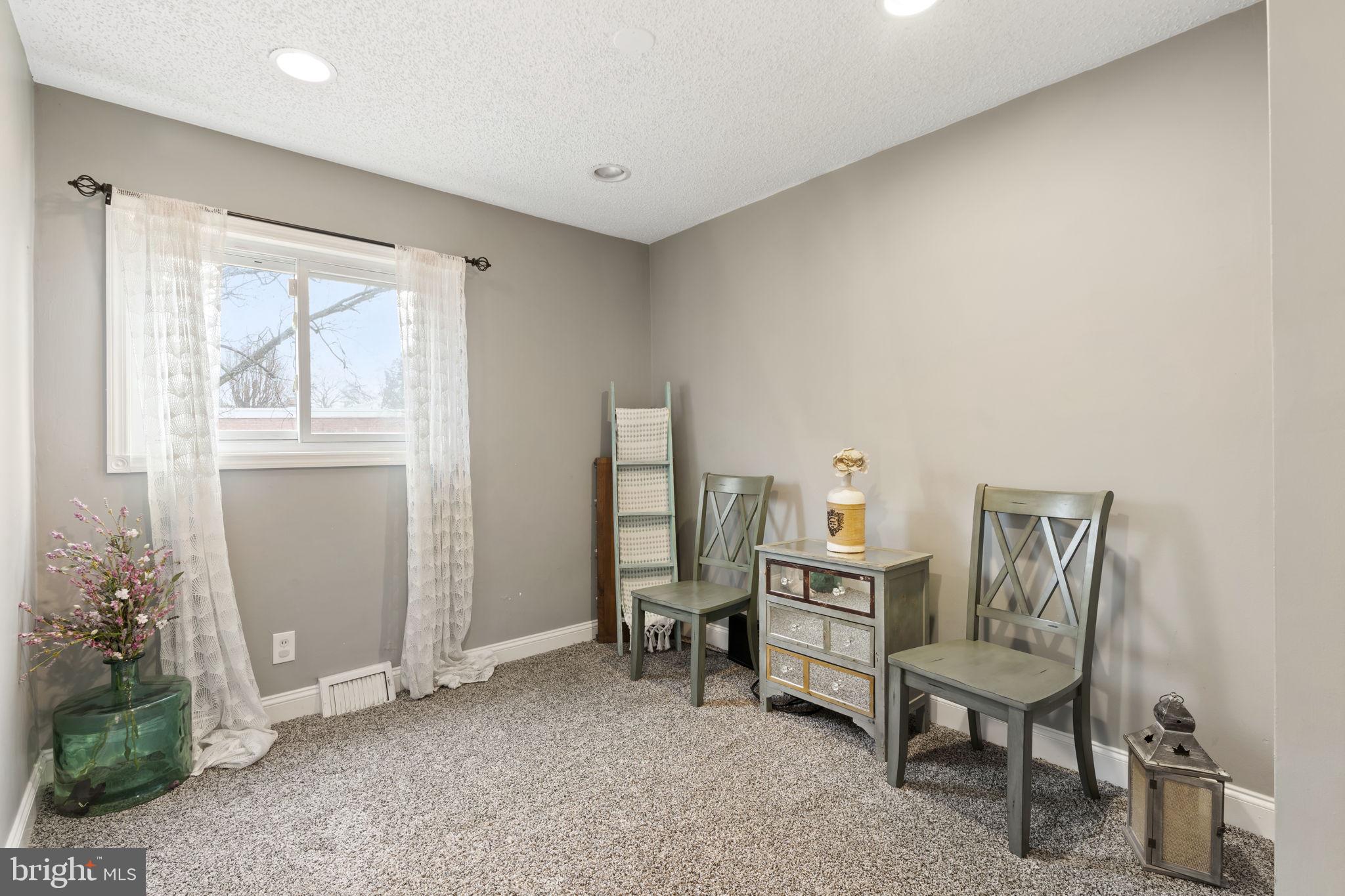 201 Juniper Road Havertown, PA 19083 - Photo 15 of 30 a view of a workspace with furniture and a window