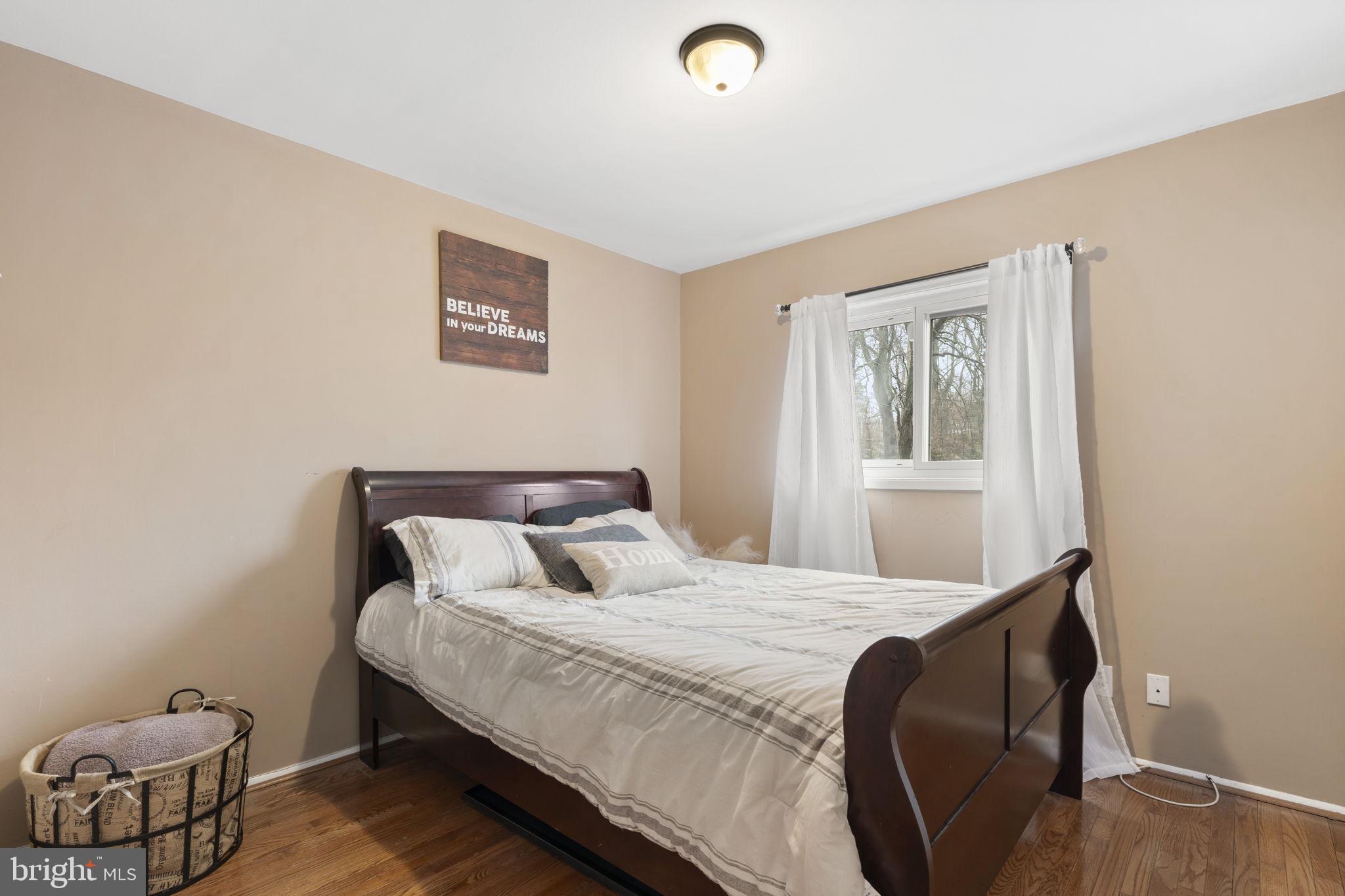 201 Juniper Road Havertown, PA 19083 - Photo 16 of 30 a bedroom with a bed and a window
