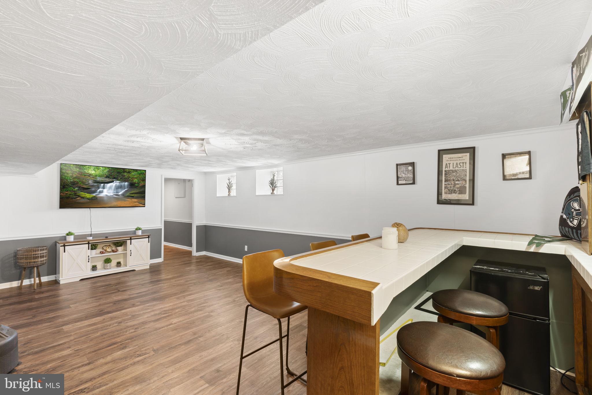 201 Juniper Road Havertown, PA 19083 - Photo 19 of 30 a room with furniture and a flat screen tv