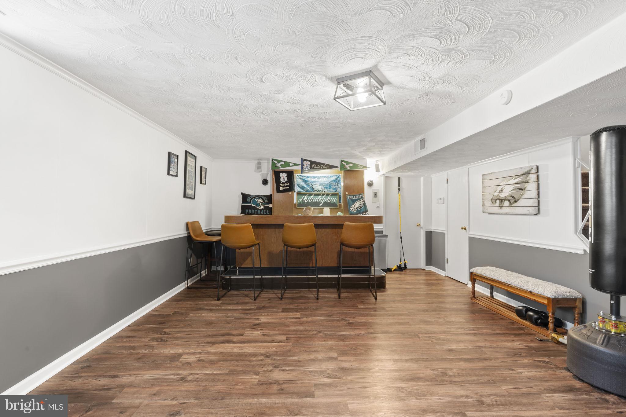 201 Juniper Road Havertown, PA 19083 - Photo 20 of 30 a bed room with furniture and a wooden floor