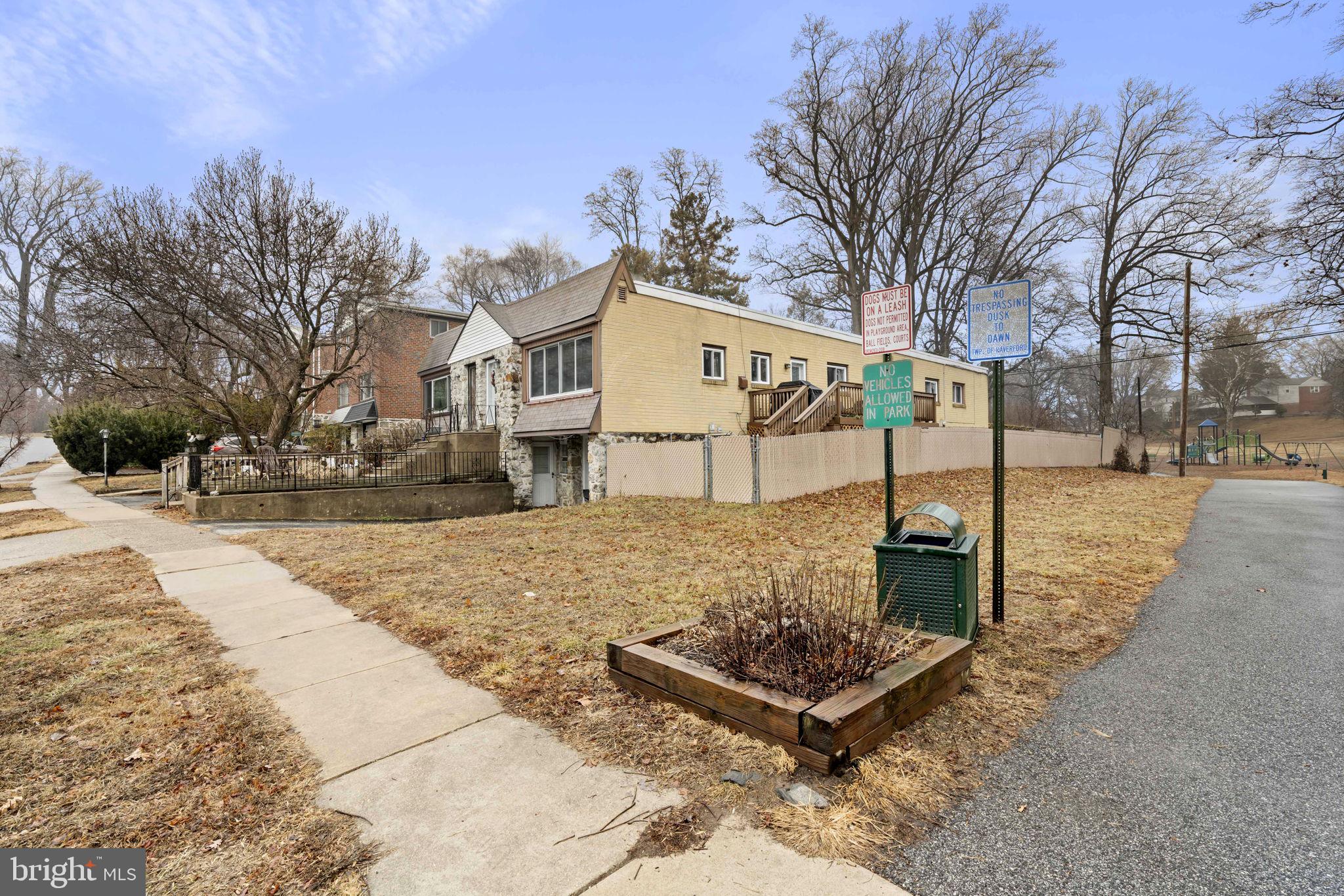 201 Juniper Road Havertown, PA 19083 - Photo 2 of 30 a front view of a house with a yard covered with snow