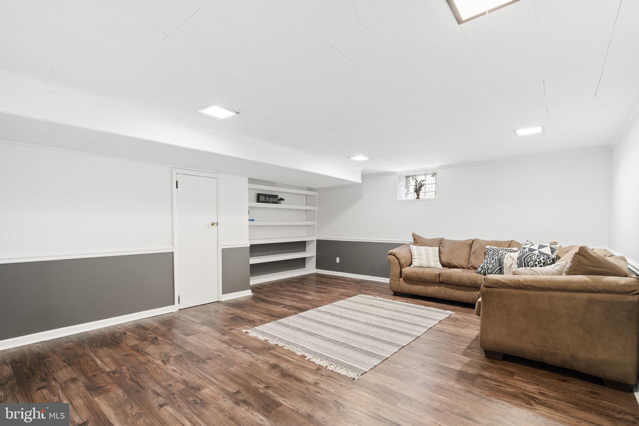 201 Juniper Road Havertown, PA 19083 - Photo 21 of 30 a living room with furniture and wooden floor