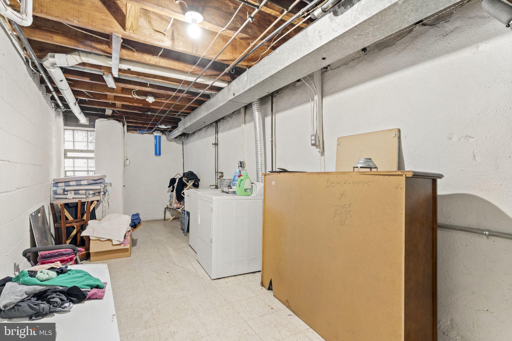 201 Juniper Road Havertown, PA 19083 - Photo 23 of 30 a view of storage and utility room with washer and dryer