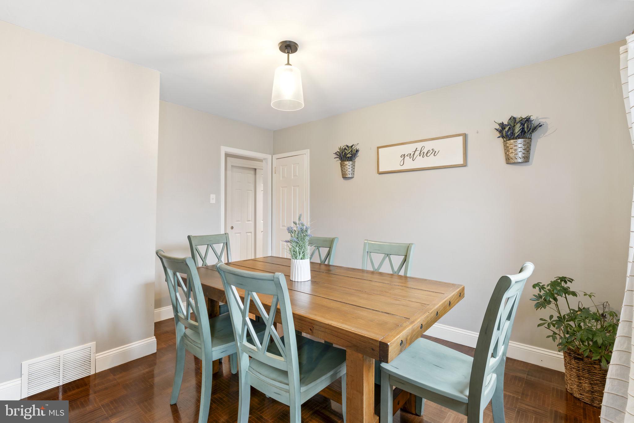 201 Juniper Road Havertown, PA 19083 - Photo 10 of 30 a view of a dining room with furniture and wooden floor