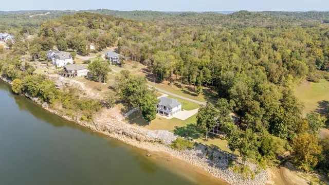 a view of a swimming pool with an outdoor seating