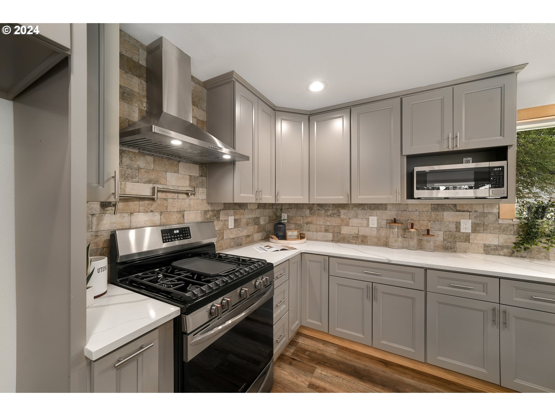 10271 Shaff Road Southeast Aumsville, OR 97325 - Photo 11 of 32 a kitchen with a sink cabinets and appliances