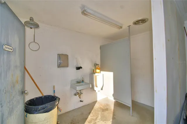 a bathroom with a sink and a toilet