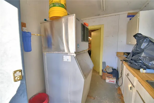 a bathroom with a sink toilet and mirror