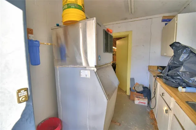 a bathroom with a sink toilet and mirror