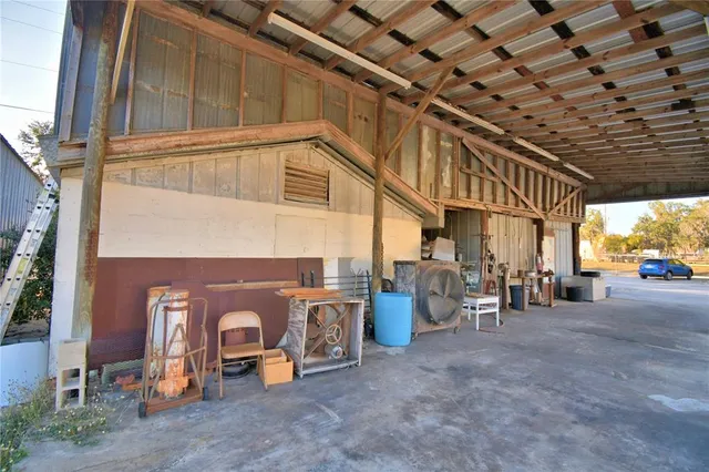 a view of a porch with furniture