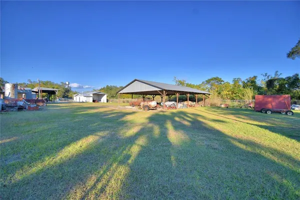 a view of an house with outdoor space and sitting area