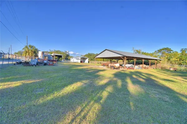 a front view of house with yard and seating