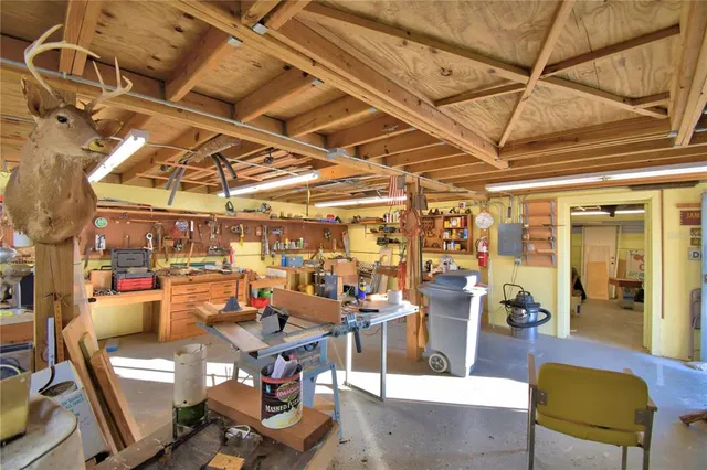 a view of a livingroom with furniture and a table