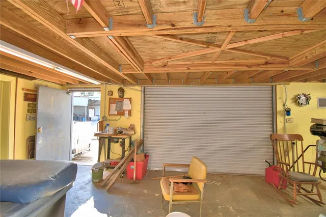 a view of a patio with table and chairs