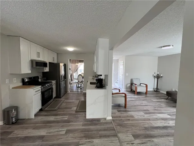 a kitchen with a sink and counter top space