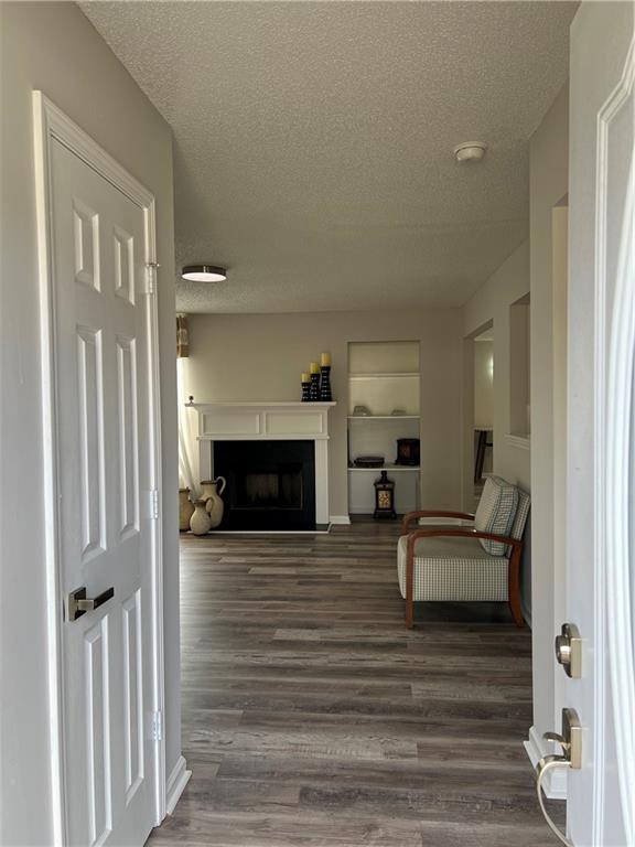 509 Vaughan Valley View Hampton, GA 30228 - Photo 3 of 38 a living room with furniture and a fireplace