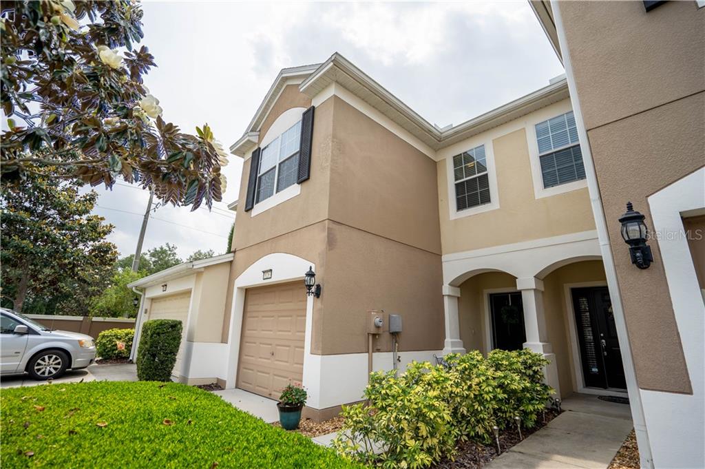 10263 Red Currant Court Riverview, FL 33578 - Photo 1 of 1 a view of a white house with a yard