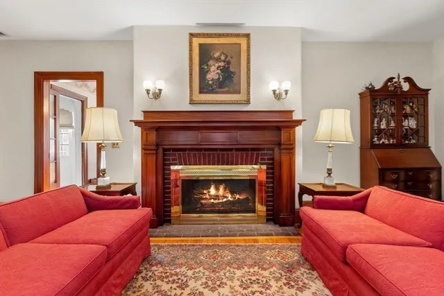 a view of a dining room with furniture wooden floor and chandelier