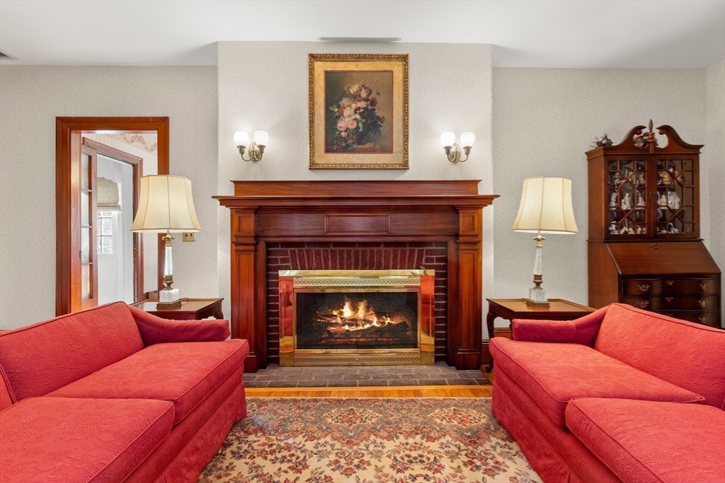 7 Fairfield Street Salem, MA 01970 - Photo 12 of 34 a living room with furniture and a fireplace