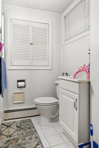 a kitchen with a sink a stove and cabinets