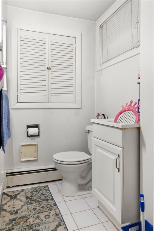 7 Fairfield Street Salem, MA 01970 - Photo 29 of 34 a bathroom with a toilet a sink and a window