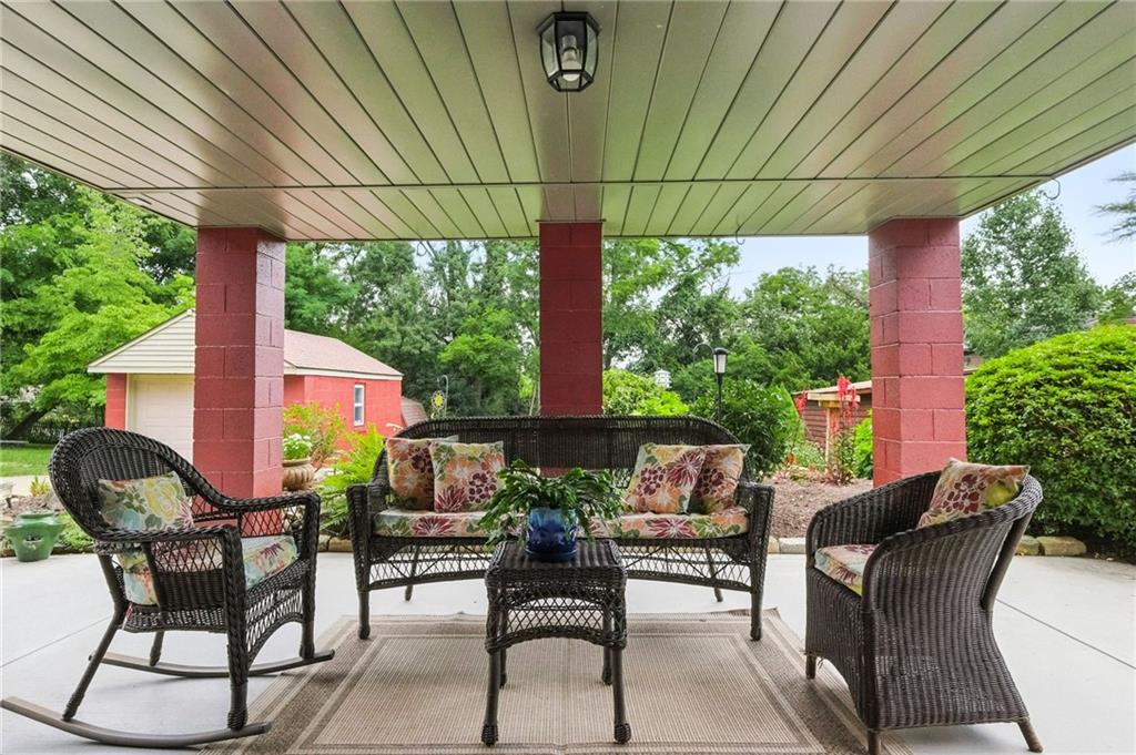 30 Colecrest Street Carnegie, PA 15106 - Photo 34 of 41 a view of an outdoor sitting area with furniture and umbrella