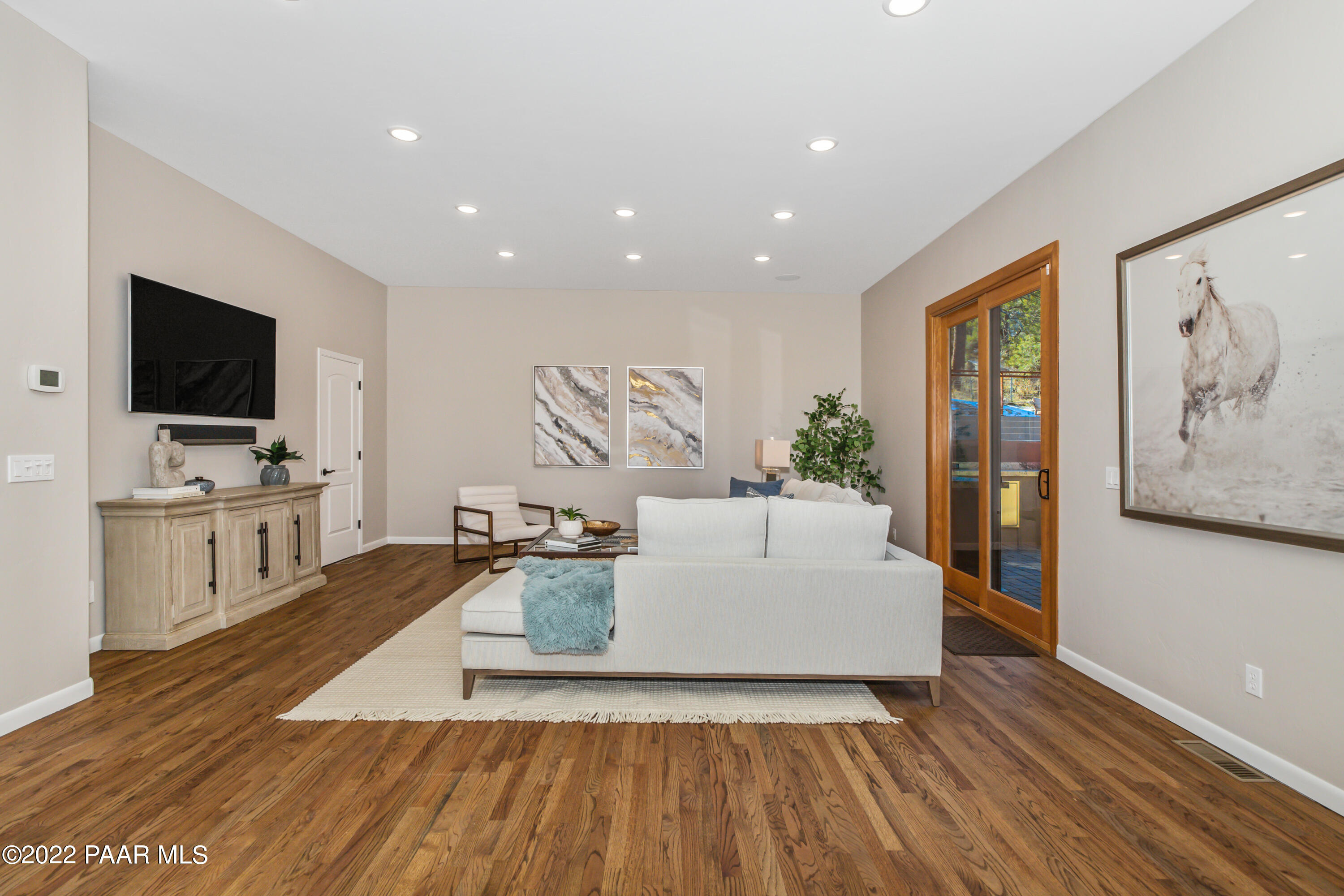3000 Shadow Valley Ranch Road Prescott, AZ 86305 - Photo 11 of 54 a living room with furniture and a flat screen tv