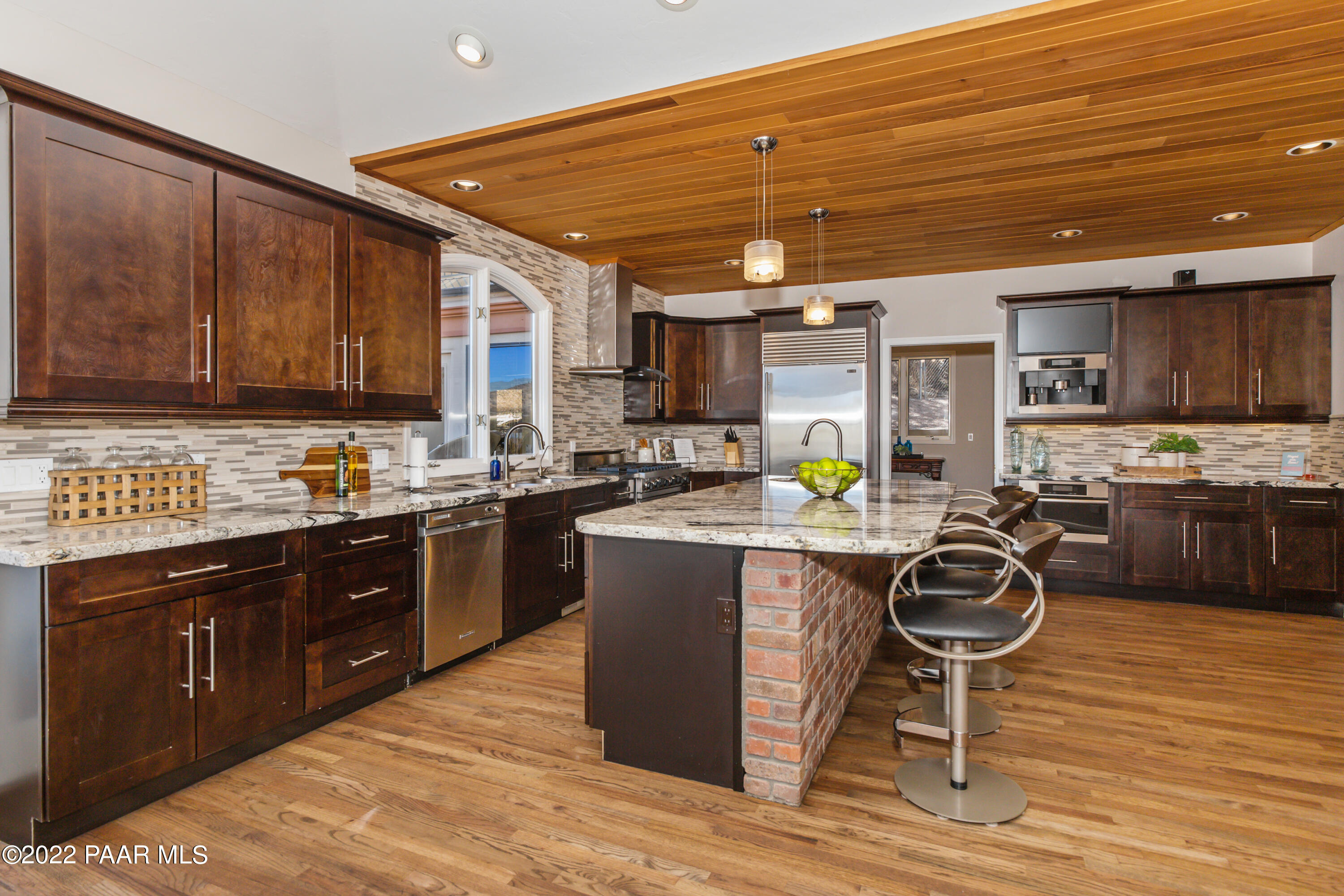 3000 Shadow Valley Ranch Road Prescott, AZ 86305 - Photo 14 of 54 a kitchen with stainless steel appliances granite countertop a stove sink and cabinets