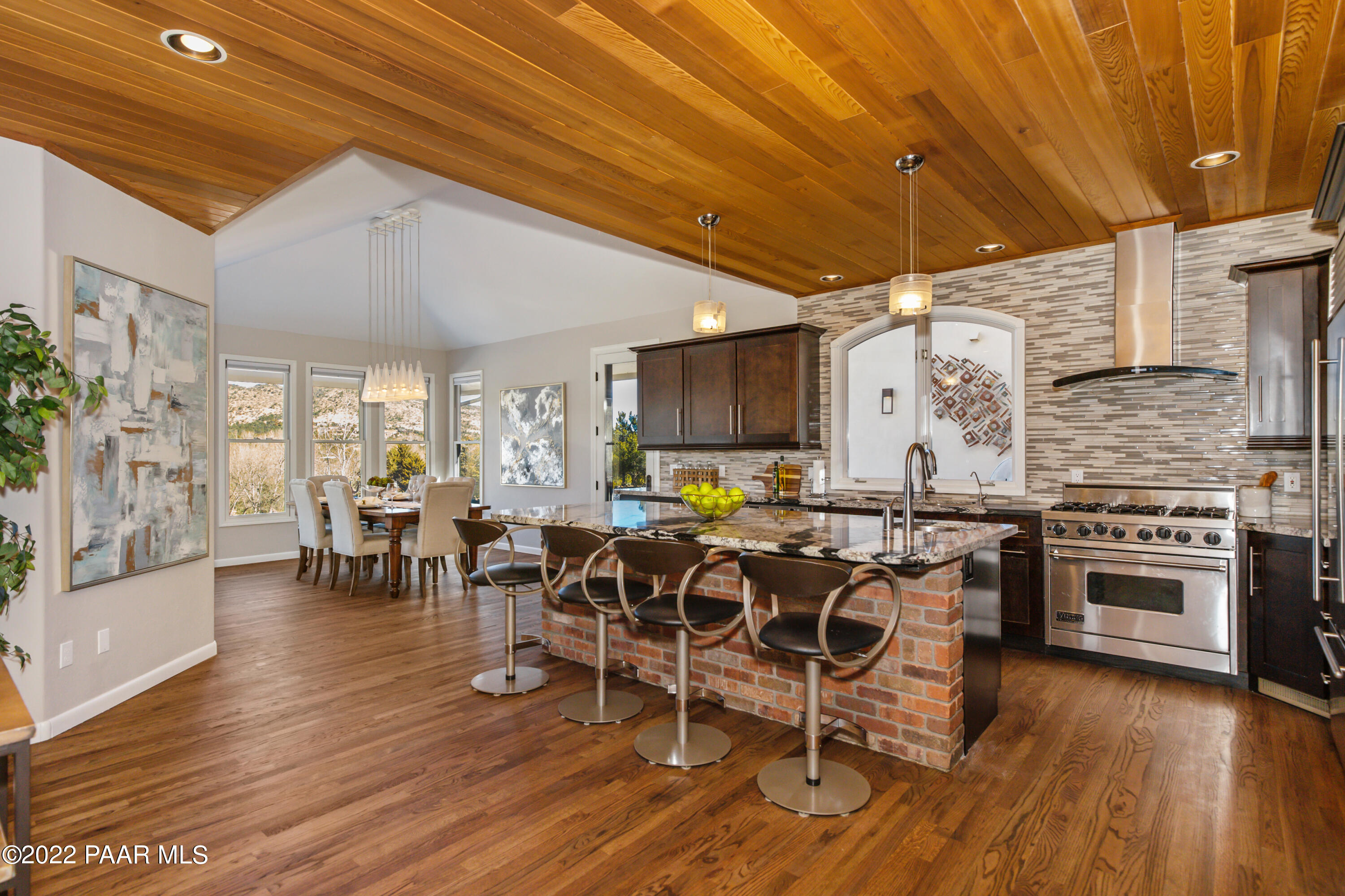 3000 Shadow Valley Ranch Road Prescott, AZ 86305 - Photo 15 of 54 a view of a dining room with furniture window and wooden floor
