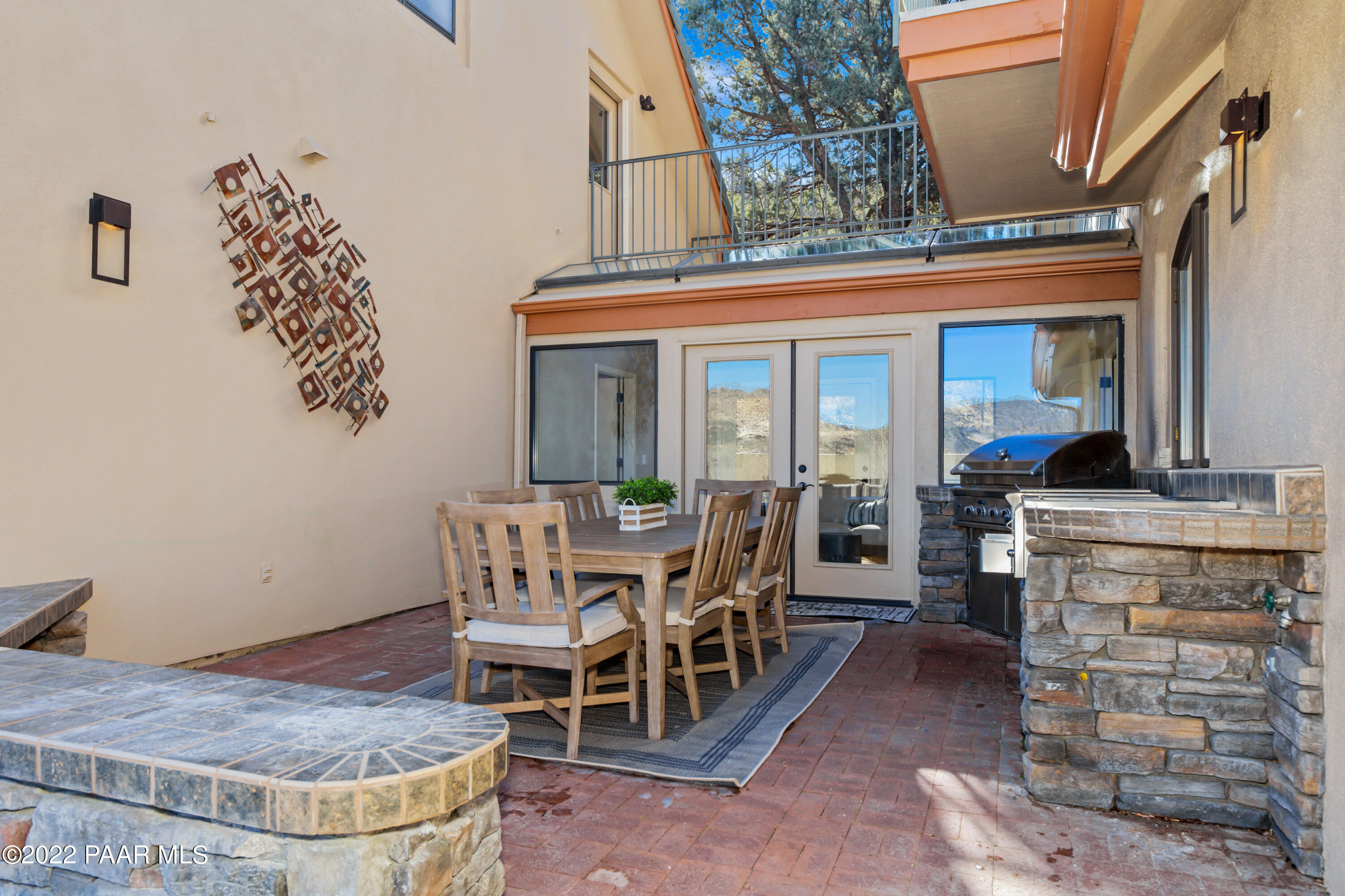3000 Shadow Valley Ranch Road Prescott, AZ 86305 - Photo 18 of 54 a view of a dining room with furniture and a chandelier