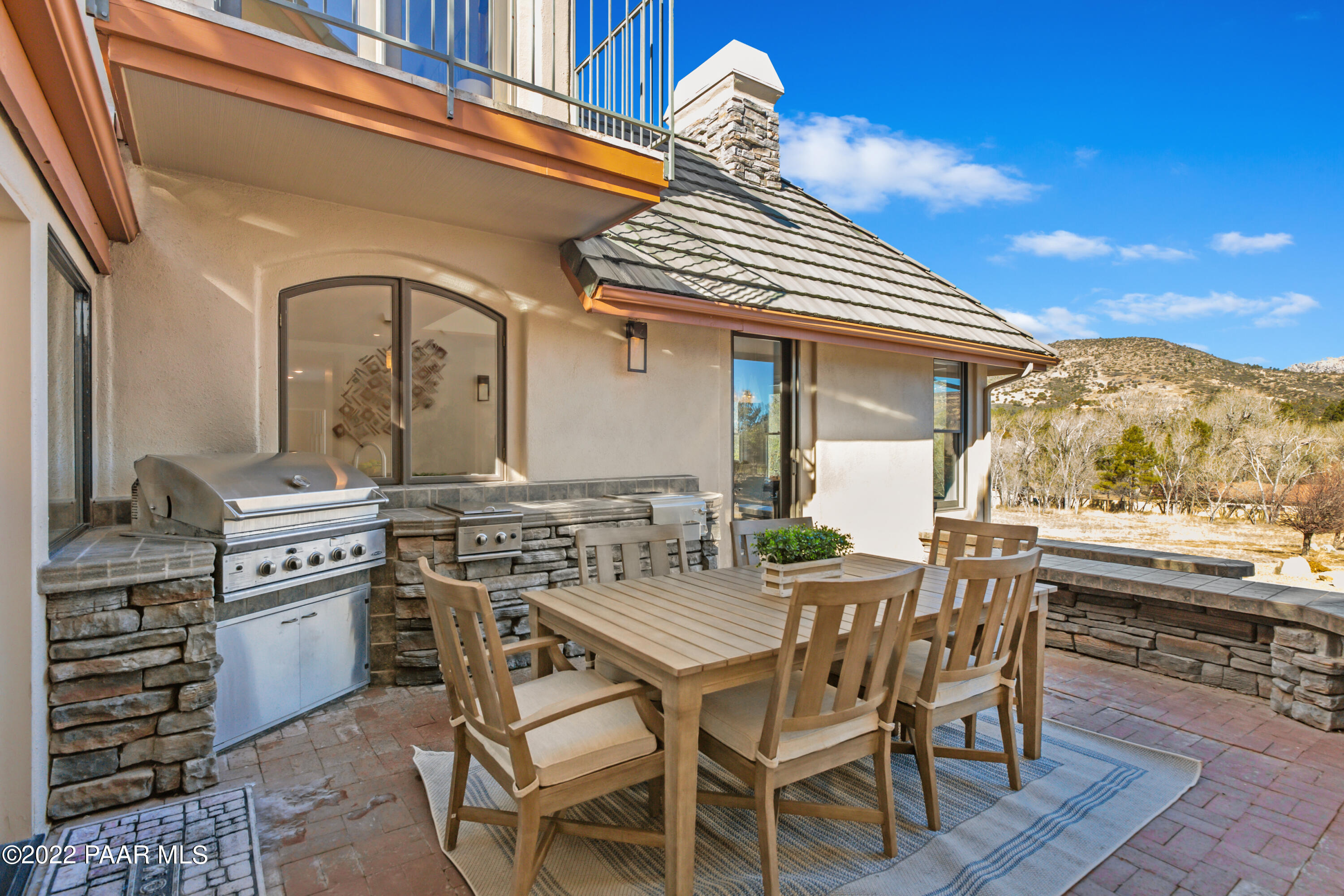 3000 Shadow Valley Ranch Road Prescott, AZ 86305 - Photo 19 of 54 a view of a dining room with furniture window and wooden floor