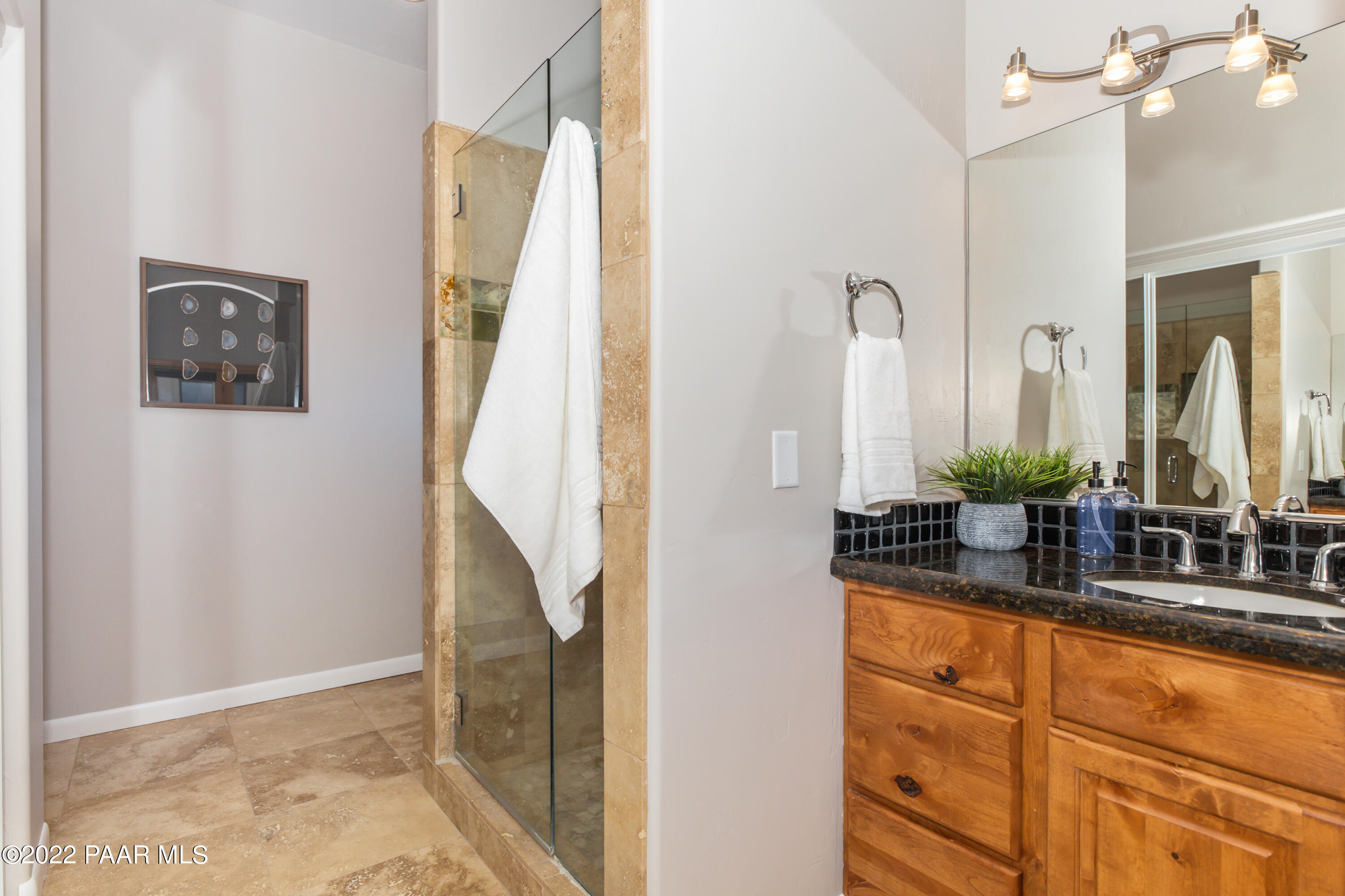 3000 Shadow Valley Ranch Road Prescott, AZ 86305 - Photo 34 of 54 a bathroom with a double vanity sink and a mirror