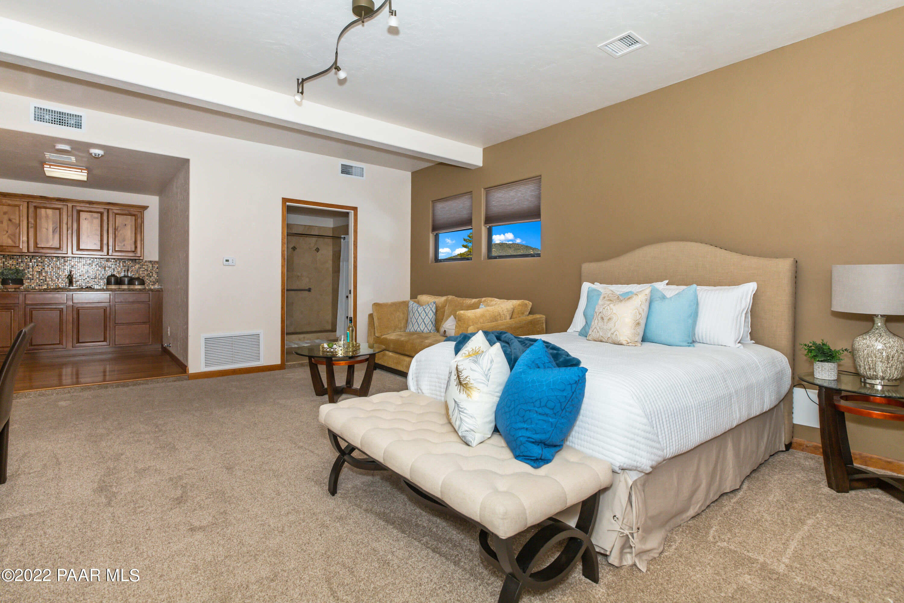 3000 Shadow Valley Ranch Road Prescott, AZ 86305 - Photo 37 of 54 a bedroom with a bed and large mirror