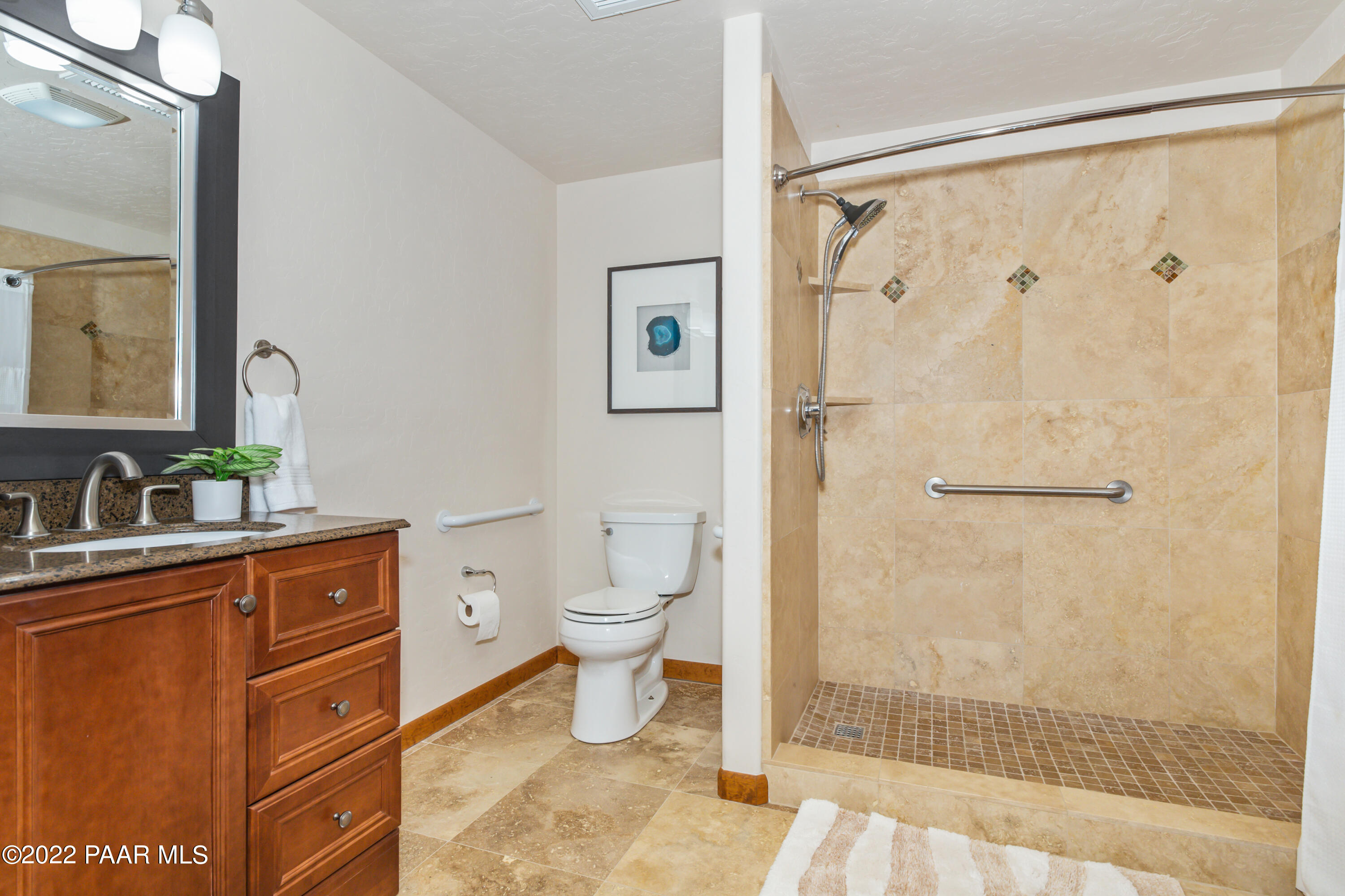 3000 Shadow Valley Ranch Road Prescott, AZ 86305 - Photo 38 of 54 a bathroom with a granite countertop sink toilet and shower