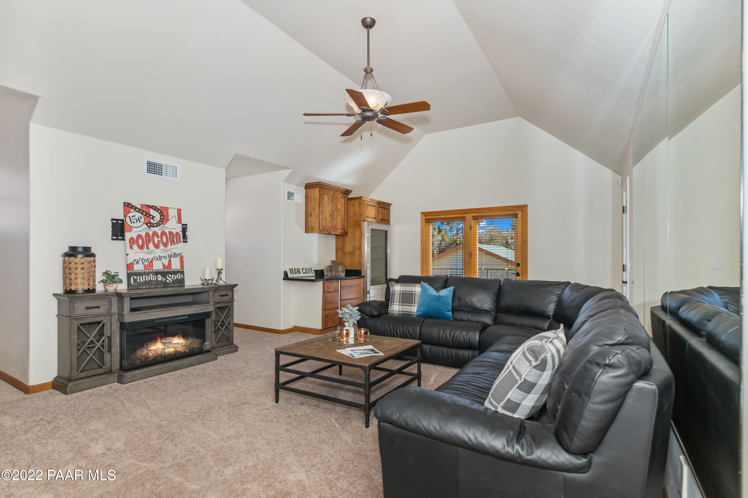 3000 Shadow Valley Ranch Road Prescott, AZ 86305 - Photo 39 of 54 a living room with furniture and a fireplace
