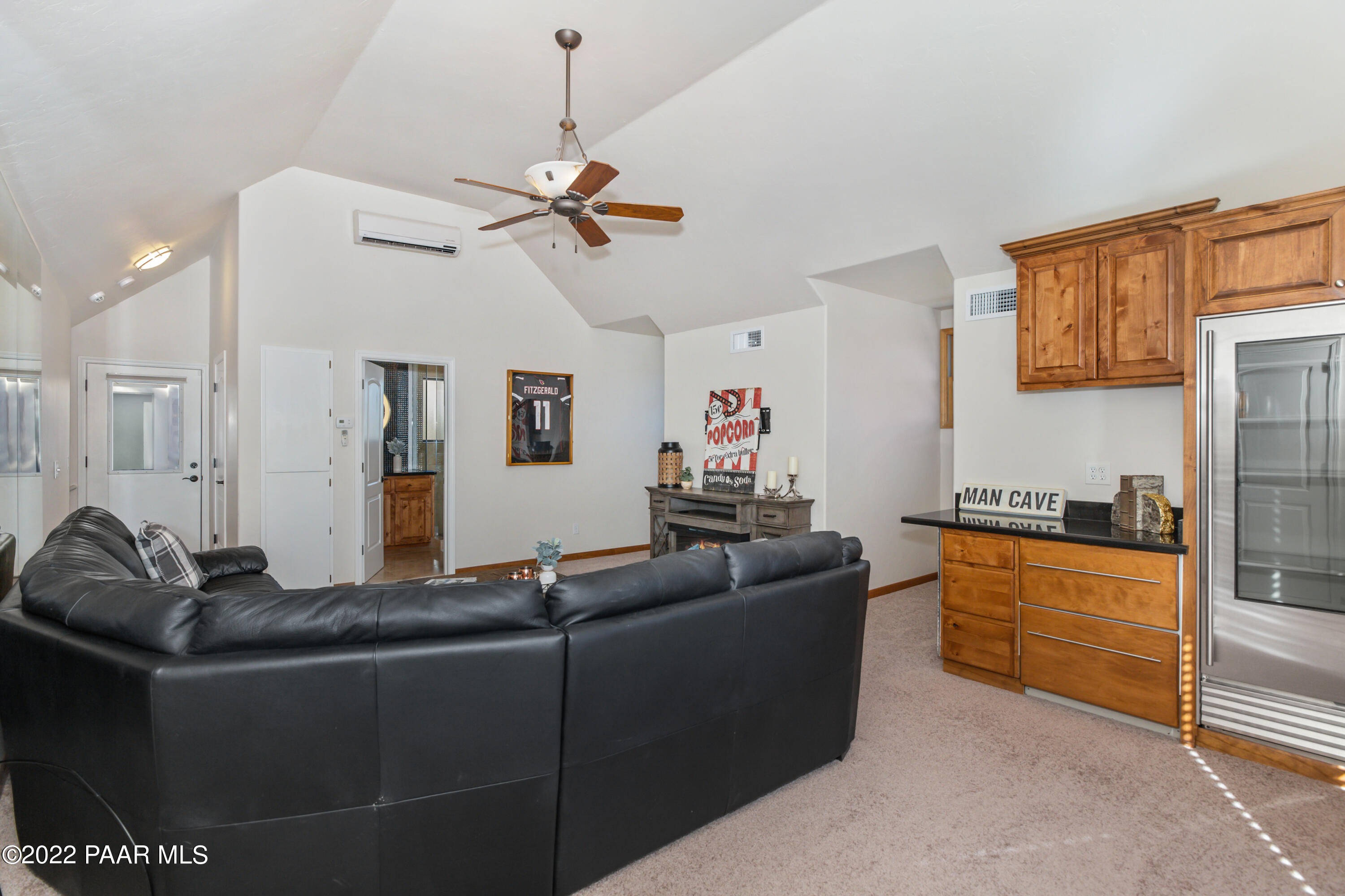 3000 Shadow Valley Ranch Road Prescott, AZ 86305 - Photo 40 of 54 a living room with furniture a ceiling fan and a window