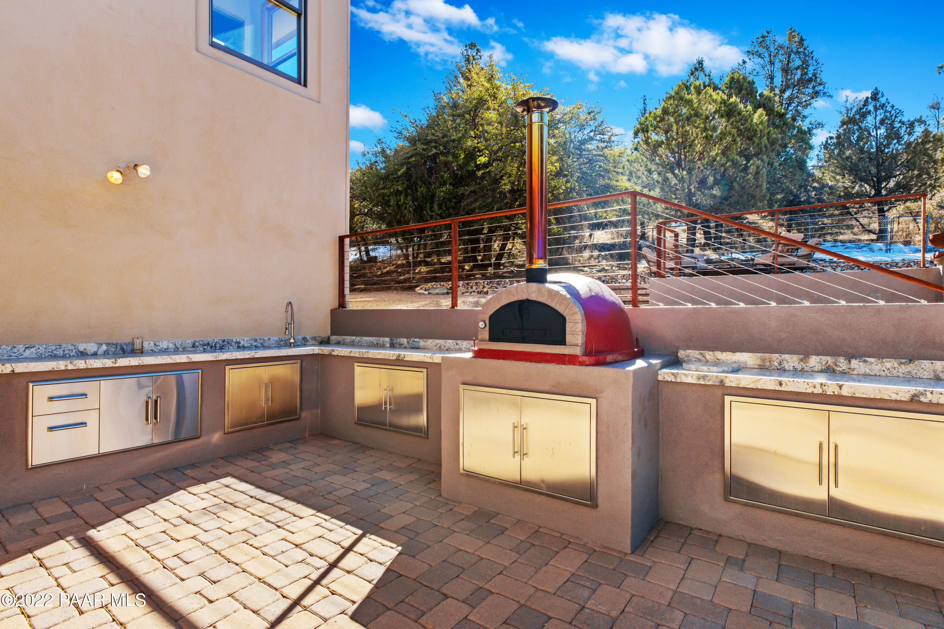 3000 Shadow Valley Ranch Road Prescott, AZ 86305 - Photo 44 of 54 a terrace of a house with wooden floor and outdoor seating